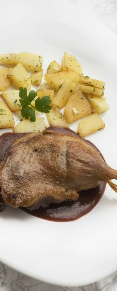 CONFIT DE PATO CON PATATAS Y SALSA DE HIGOS
